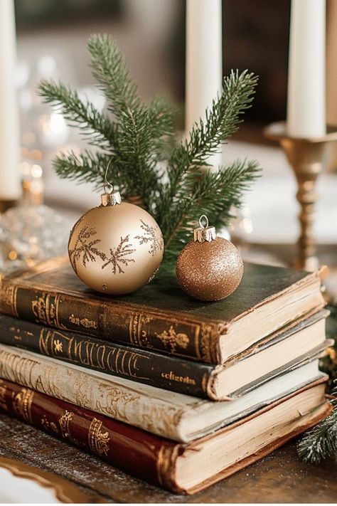 Upcycle old books into a charming Christmas centerpiece! This unique idea combines vintage charm with holiday sparkle. Great for book lovers and antique enthusiasts. Some of the links in my articles are affiliate links. If you make a qualified purchase from one of my links I will make a small commission at no cost to you. Thank you for your support!!! Books For Centerpieces, Antique Book Display Ideas, Book Mantle Decor, Vintage Christmas Book Decor, Victorian Christmas Centerpieces, Vintage Christmas Centerpieces For Table, Living Room Side Table Decor Ideas, Christmas Book Decor, Vintage Christmas Coffee Table Decor