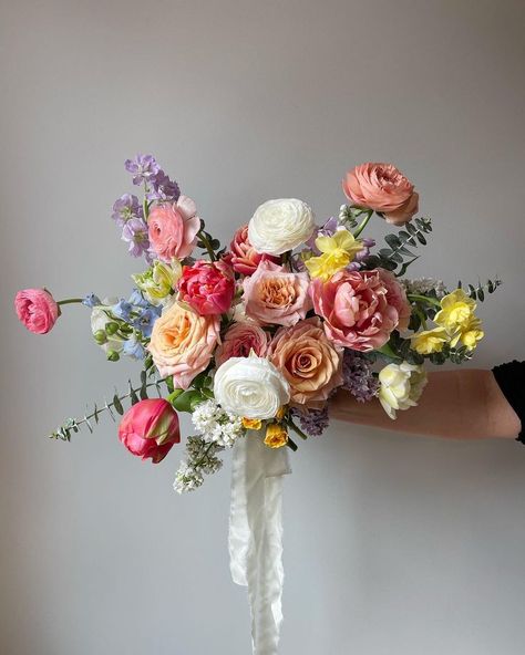 Spring bridal bouquet with tulips, ranunculus and garden roses Bouquet With Tulips, Tulip Bridal Bouquet, Ranunculus Wedding Bouquet, Spring Bridal Bouquet, Ranunculus Wedding, Garden Rose Bouquet, Colorful Bridal Bouquet, Wedding Flowers Tulips, Ranunculus Bouquet