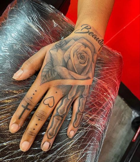 Female Rose Hand Tattoo, Money Rose Hand Tattoo For Women, Cover Up Name Tattoos For Women On Hand, Good Hand Tattoos, Cute Skeleton Hand Tattoo, Rip Hand Tattoos For Women, Memorial Hand Tattoos For Women, Female Hand Tattoos Ideas, Tattoo Ideas Female Gangsta