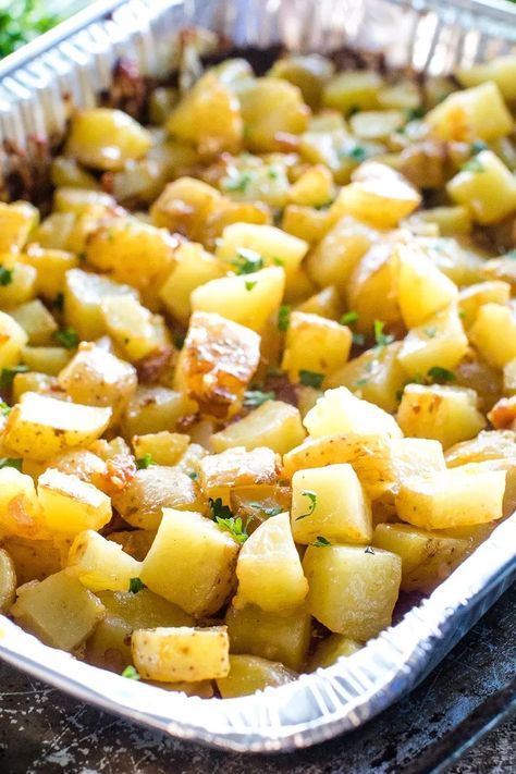 These Cheesy Potatoes on the Grill with Bacon are diced potatoes loaded with butter, onions, bacon and cheese grilled in a foil pan for quick and easy clean up! These grilled potatoes are the perfect side dish that everyone will love! #gimmesomegrilling #potatoes #bacon #onions #cheese #grilledpotatoes #grilling #grilled #recipe #grillingrecipe #sidedish #sidedishrecipe Potatoes On The Grill, Potatoes Loaded, Cheesy Bacon Potatoes, Potatoes With Bacon, Grilled Side Dishes, Bbq Potatoes, Barbecue Sides, Bacon Potato, Grilling Sides