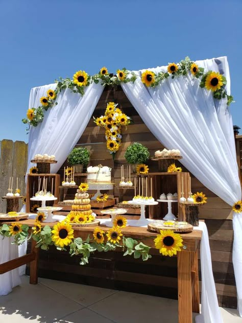 Feast your eyes on this splendid sunflower 1st Communion celebration! The dessert table is beautiful!See more party ideas d share yours at CatchMyParty.com #catchmyparty #partyideas #sunflowerparty #rusticparty #1stcommunion #holycommunion #desserttable Sunflower Party Theme Decoration, Sunflower Themed Birthday Party, Sunflower Desserts, Sunflower Birthday Party Decoration, Sunflower Party Ideas, Sunflower Theme Party Decorations, Sunflower Party Theme, Sunflower Baby Shower Ideas, Sunflower Themed Party