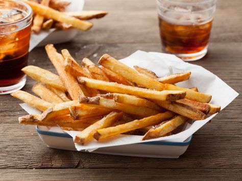 These tangy boardwalk-inspired spuds are soaked in vinegar, refrigerated and then fried to a golden brown finish. Oven Baked French Fries, Cooking Channel Recipes, French Fries Recipe, Carnival Food, State Foods, Fries Recipe, Cooking Channel, Fair Food Recipes, Top Recipes