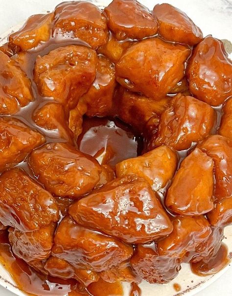 If you’re in search of the perfect pull-apart bread to bring to a gathering, then Monkey Bread is the way to go. Who could resist its fluffy, cinnamon-spiced dough and ooey-gooey, sticky glaze? Not to mention its fun, entertaining shape– a great conversation starter at any potluck. This article will explain exactly how to make Monkey Bread from scratch, giving you the tips and tricks necessary to create a delicious, show-stopping centerpiece that everyone will be asking about.Monkey Br… Sticky Pull Apart Bread, Monkey Bread Glaze, Pull Apart Sticky Buns, Best Monkey Bread Recipe, Oven Home Fries, Monkey Bread From Scratch, Biscuit Monkey Bread, Pumpkin Monkey Bread, Monkey Bread Recipe Easy