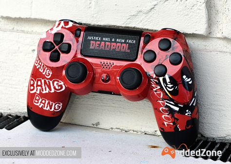 Check out our new release "Deadpool" #PS4 RAPID FIRE CUSTOM MODDED CONTROLLER. Add 35 mods to PS4 controller to CRUSH THE COMPETITION!  Get yours today at www.moddedzone.com #customcontroller #ps4controller #moddedcontroller Custom Controllers Ps4, Playstation Room, Control Xbox, Ps4 Controller Custom, Ps4 Accessories, Nfl Football Helmets, Video Games Ps4, Play 4, Gamer Setup