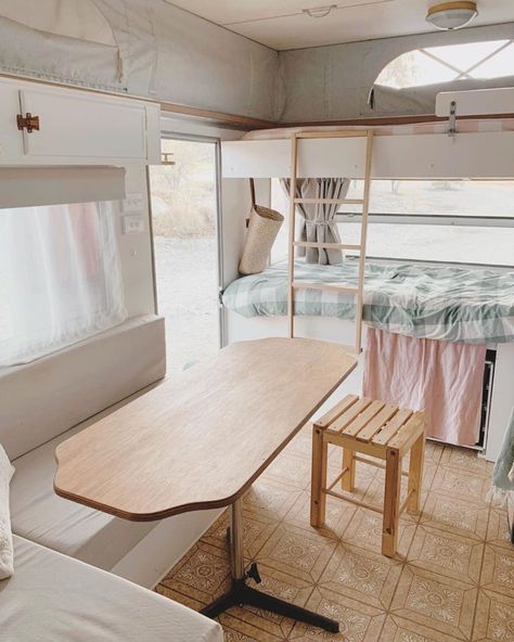 Caravan bunk bedding in pastel colours helps to keep this pop-top caravan light and airy. #caravanbunkbeds #caravanbunks #RVbunks #caravanbunkbedladder #RVbunkbedladder Caravan Bunk Beds, Caravan Bunks, Caravan Renovation Diy, Caravan Interior Makeover, Vintage Caravan Interiors, Diy Caravan, Caravan Living, Bed Ladder, Bunk Bed Ladder