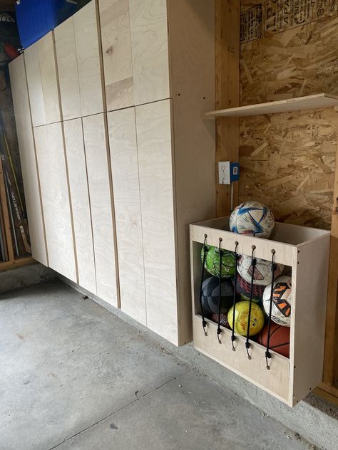 How to organize your garage with DIY cabinets — Built by Caitlin How To Organize Screws And Nails Garage, Diy Garage Lockers, Garage Ikea Hacks, Build Garage Cabinets, Diy Garage Cabinets Ideas, Diy Garage Projects, Garage Shelves With Doors, Diy Sports Equipment Storage, Diy Garage Storage Cabinets Wall