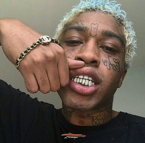 Lil Tracy, Of Ideas, Tattoos