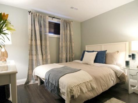 BASEMENT BEDROOM IDEAS – Perhaps some of you still have some unused space within the basement of your house. You can change the area into wonderful ba... Basement Window Curtains, Basement Media Room Ideas, Basement Window, Light Paint Colors, Basement Guest Rooms, Minimalist Space, Cozy Basement, Basement Windows, Dark Bedroom