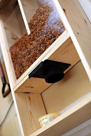 Garage Landing, Dog Food Storage Ideas, Dog Food Storage Diy, Make Shelf, Dog Food Dispenser, Food Storage Ideas, Between Studs, Dog Food Station, Dispenser Diy