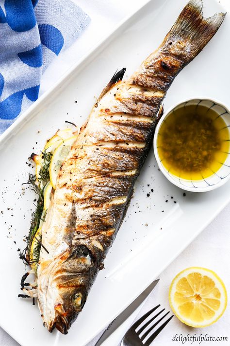 Grilled whole branzino looks impressive, the skin is crispy and the inside is juicy. Learn all the easy steps to grill and serve grilled whole fish. Bronzino Recipe, Branzino Fillets Recipe, Whole Branzino, Branzino Recipe, Grill Dinner, Whole Fish Recipes, Chicken Sauce Recipes, Lemon Caper Sauce, Grilled Fish Recipes