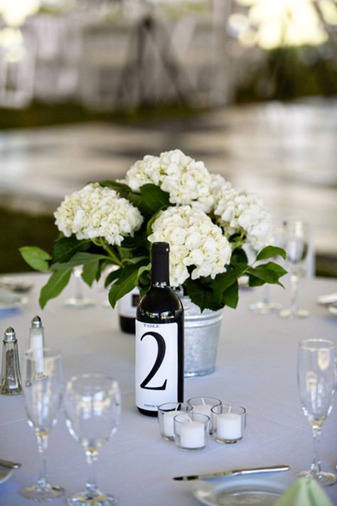 white hydrangeas in galvanized buckets. Centerpices or maybe on the drink and buffet tables? Wine Theme Wedding, Wine Bottle Table, Bucket Flower, Tin Bucket, Galvanized Buckets, Hydrangea Centerpiece, Champagne Bucket, White Hydrangeas, Wine Table