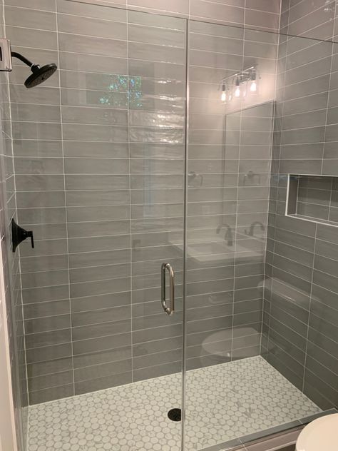 Grey Tile Shower Wall, Dove Gray Tile Bathroom, Grey Tile Shower Bathroom, Gray Bathroom Tile Ideas Wall, Grey Tile Walk In Shower Ideas, Gray White Shower Tile, Gray Vertical Tile Shower Ideas, Grey Glass Tile Bathroom, Lowes Shower Tile Ideas