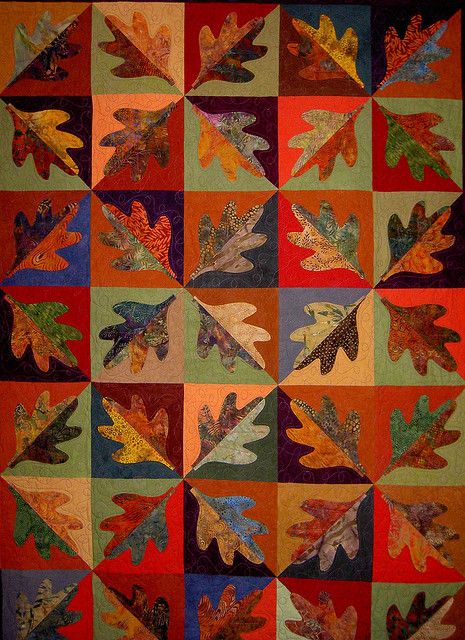 I made this pattern (not this quilt) in batiks and it is lovely (and fun to make--you make a block, cut it in half, then sew the halves together any way you like) . Fall Quilt Blocks Autumn Leaves, Four Seasons Quilt Patterns, Quilt Colour Schemes, Maple Leaf Quilt, Leaf Quilts, Leaves Quilt, Autumn Quilt, Autumn Quilts, Leaf Quilt