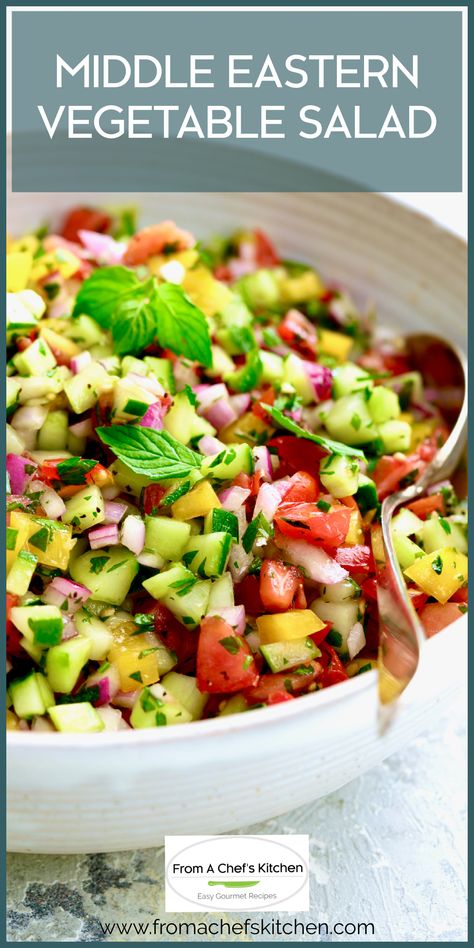 Photo of Middle Eastern Vegetable Salad in white bowl garnished with fresh mint sprigs. Middle Eastern Vegetable Salad, Middle Eastern Side Dishes Veggies, Middle Eastern Vegetable Recipes, Middle Eastern Vegetables, Middle Eastern Salad Recipes, Middle Eastern Side Dishes, Best Chicken Taco Recipe, Ranch Tacos, Middle Eastern Salad