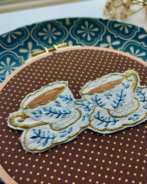 Cup of tea? ☕️✨ I FINALLY finished my china tea set. I wasn’t in love with the sparkles so I tore out the cups and put them on a patterned background. I’m kinda loving the end result!🤩 This hoop design is available in my shop.🤍 #tea #handembroidery #embroideryhoop #handembroidered #embroideryart #hoopart #embroiderydesign #embroiderylove #diycrafts #tealover Patterned Background, China Tea Sets, Hoop Design, China Tea, Hoop Art, Cup Of Tea, Tea Lover, Embroidery Hoop, Embroidery Art