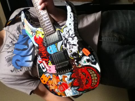 Ibanez Gio covered in stickers Sticker Covered Guitar, Guitar Covered In Stickers, Ibanez Guitars, Guitar Stickers, Hair Haircuts, Short Hair Haircuts, Castiel, Clothing Items, Electric Guitar