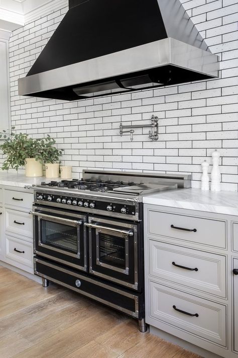 Kitchen Hood Ideas, Art Curation, Oven Ideas, Kitchen Hood Design, Blue Painted Walls, Wood Burning Oven, Natural Wood Flooring, Wood Backsplash, Black Countertops