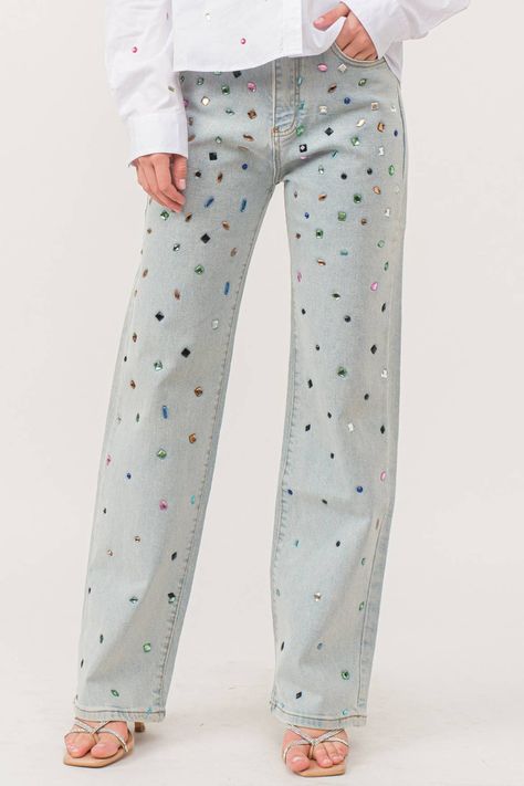 Rhinestone denim pants Stretch denim Straight leg fit Multicolor hotfix rhinestone embellishment. Front zip and button closure Classic 5-pocket construction Styled with Model is 5 ft 6 in, wearing a Small. Bust: 32 in Waist: 24 in Hips: 35 Fun Jeans Outfit, Rhinestone Denim Pants, Jeans Inspo Outfit, Rhinestone Jeans Outfit, Women’s Jeans, Bejeweled Jeans, Rhinestone Pants, Colorful Jeans, Fun Jeans