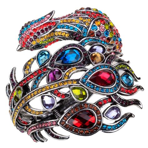 PRICES MAY VARY. Big hinged peacock cuff bracelet measures 2.75inch wide (widest end) fits women wrist circumference from 6.5 to 7.5 inch Alloy with antique silver plated, lead and nickle free, hypoallergenic to sensitive skin Big stones are resin beads, rest are crystals Comes in a beautiful jewelry box, a thoughtful jewelry gift will be cherished for years to come Fashion jewelry fits for daily wearing home or office, gift to express your love for your mother, girlfriend, fiancee,wife, valenti Peacock Bracelet, Peacock Ring, Hallowen Costume, Cuff Jewelry, Crystal Bangle, 5 To 7, Chan Luu, Special Jewelry, Rhinestone Bracelet