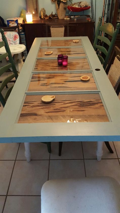 dinner table from old door with pecky Cypress inlays and old table base Old Door Countertops, Kitchen Table Made From Old Door, Dining Table Made From Old Door, Table From Old Door, Table Made From Old Door, Side Table From Old Door, Old Door Tables, Door Dining Table, Living Room Industrial