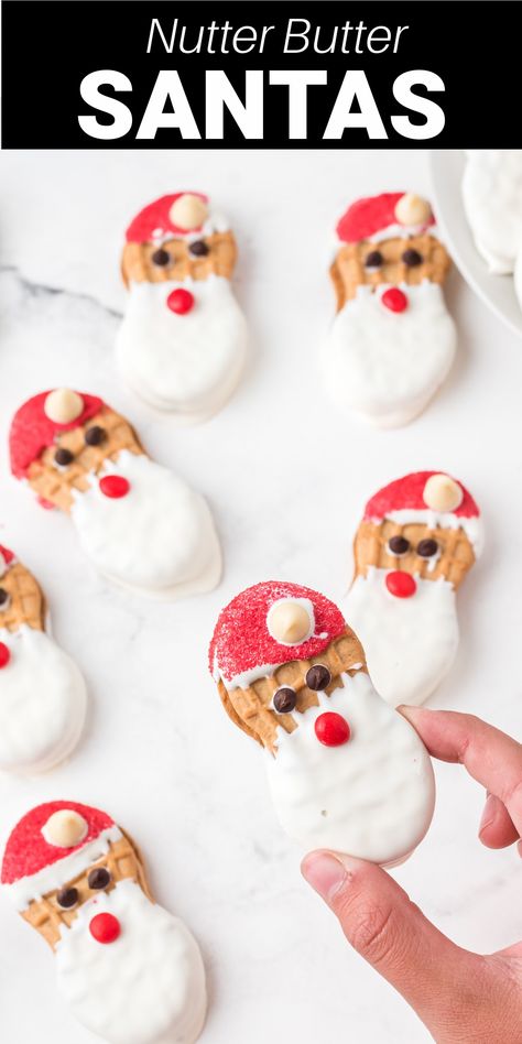 Santa Nutter Butter Cookies are the perfect addition to your Christmas cookie exchange. Peanut nut nutter butter cookies are dipped in chocolate and made to look like Santa! It's a cute treat the kids love! Santa Desserts, Santa Cookie Recipe, Festive Cookie Recipes, Christmas Cookies Kids, Nutter Butter Cookies, Best Christmas Recipes, Dipped Cookies, Nutter Butter, Festive Cookies