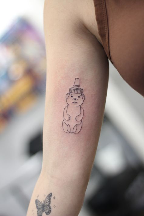 honey bottle tattoo line work black work minimalist tattoo Honey Bear Bottle Tattoo, Honeybear Tattoo, Honey Dipper Tattoo, Honey Bottle Tattoo, Honey Pot Tattoo Simple, Honey Tattoos, Small Honey Jar Tattoo, Honey Tattoo Ideas, Honey Bear Tattoo