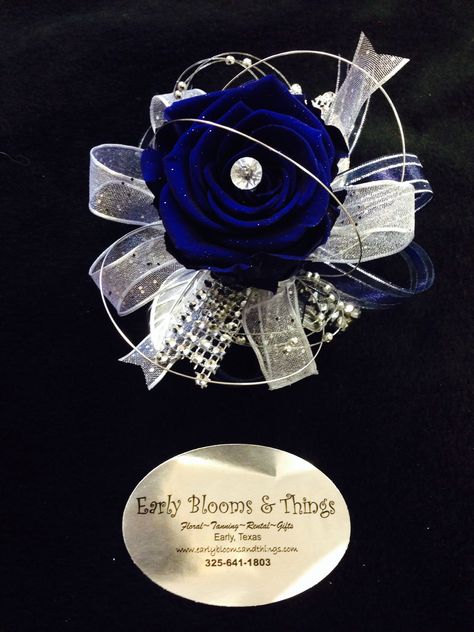 Royal blue/silver keepsake corsage Prom Wrist Corsage Ideas Royal Blue, Prom Coursage Ideas Blue, Royal Blue And Silver Corsage, Navy Blue And Silver Corsage And Boutonniere, Black And Blue Corsage, Prom Corsage Blue, Blue Corsage, Wrist Corsage Prom, Prom Corsage And Boutonniere