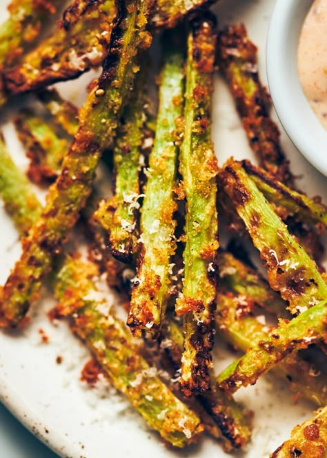 Don't throw out your broccoli stalks! Turn leftover broccoli stems into fries instead. These delicious broccoli fries are coated in panko and seasonings for crunch. Cooking the broccoli in an air fryer makes these fries crispy, with barely any oil. (Vegan, Gluten Free option) Charcuterie Chips, Veggie Air Fryer, Broccoli Fries, Smoked Salmon Crostini, Salmon Crostini, April Recipes, Garden Vegetable Recipes, Air Fryer Broccoli, Air Fryer Vegan