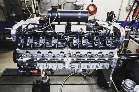 Sixteen Power's 14.0 L V16 that makes 1122 hp on 89 octane fuel Miami Boat, Ls Engine, 55 Chevy, Engine Swap, Cool Electronics, Transmission Cooler, Performance Engines, Heat Exchanger, Detroit Michigan