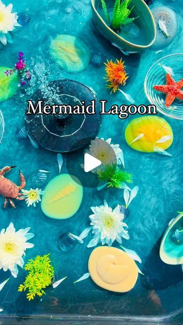 Natasha on Instagram: "Mermaid Lagoon 🧜‍♀️  - Sensory, water play  - Imaginative play  - Exploring the solar fountain  - Outdoor play   🧜‍♀️ Water base is made using the metallic ocean paints from @bakerrossltd   #tufftray #tufftrayideas #tufftrayactivities #playtray #playtrayideas #playtrayactivities #waterplay #waterplayideas #outdoorplay #sensoryplay #sensoryplayideas #sensoryactivities #playideas #playactivities #eyfs #earlyyears #eytagteam #eyfsideas #earlyyearsideas #inspiretheirearlyyears #letsshareourplay #learningwiththesmalls #simpleplay #simpleplayideas" Mermaid Sensory Play, Mermaid Sensory, Sensory Water Play, Ocean Sensory, Sensory Water, Fountain Outdoor, Mermaid Lagoon, Solar Fountain, Tuff Tray