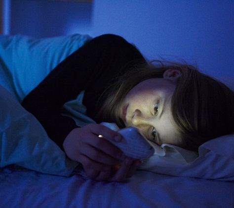 Ever fall asleep while Insta-scrolling on your smartphone—or purposely leave it on your bed while you snooze? You’re not alone: 44% of cell phone owners have slept with their phone next to their bed to make sure they didn’t miss any crucial calls or texts, according to the Pew Internet Project. But while you may have good intentions, snuggling up to your phone could be hazardous to your health. Insomnia In Children, Phone Lighting, Light Sensitivity, When You Sleep, Sleep Problems, Cant Sleep, Night Sleep, Go To Sleep, Insomnia