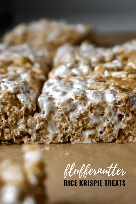 Fluffernutter Rice Krispie Treats: Ooey, gooey soft rice krispie treats are loaded with creamy peanut butter and sweet marshmallow fluff for the perfect fluffernutter flavor! | stressbaking.com @stressbaking #stressbaking #fluffernutter #ricekrispietreats #dessert #easydessert #sweet #peanutbutter #fluff Rice Krispie Treats Peanut Butter, Soft Rice Krispie Treats, Cinnamon Toast Crunch Bars, Cereal Bars Recipes, Krispie Treats Recipe, Marshmallow Treats, Cereal Treats, Dessert Simple, Cinnamon Toast Crunch