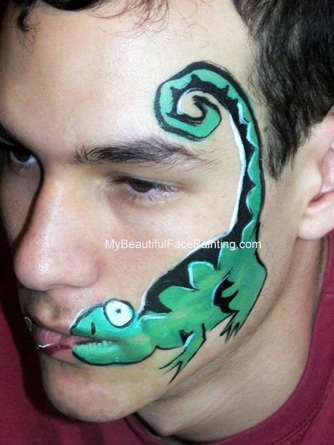 lizard eat your face. Lizard Face Paint, Chameleon Party, Cheek Art, Reptile Party, Chameleon Lizard, Face Paints, Special Fx Makeup, Face Paintings, Glitter Tattoo