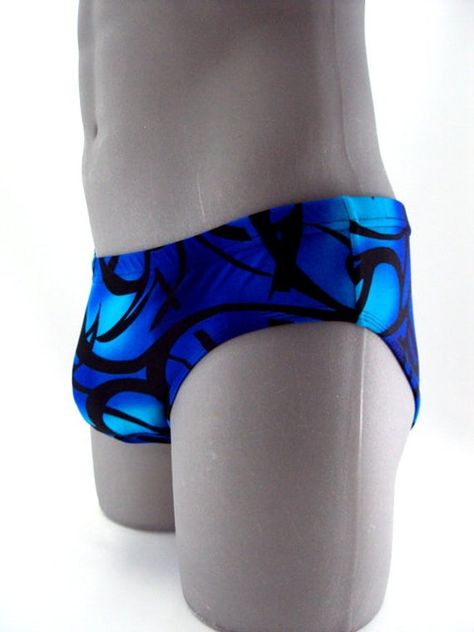 "European inspired swimwear with an excellent fit and incredible lines,double and triple row stitching ,3/4 elastic waistband, 3/8 elastic around the leg ,drawstring waistband with a 3\" inch side seams.MADE IN USA PLEASE NOTE: All print fabric designs swimsuits varies, no two are alike. Hand Wash,line dry,do not bleach Quality classic fit 3\" inch side seams Double row stitching 85 % Nylon 15 % Spandex Fully Lined" Mens Swim Trunks, Drawstring Waistband, Pull On Pants, Mens Swimwear, Swim Trunks, Bathing Suits, Fabric Design, Printing On Fabric, Womens Shorts