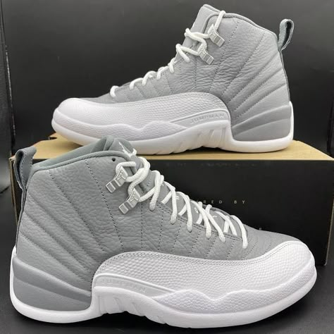 brings a neutral color palette to the historic silhouette that introduced Zoom Air cushioning to the Jordan line. The grey tumbled leather upper features the 12's signature stitched lines and a lizard-textured overlay in a solid white finish. Jordan 12s, Jordans 12, Jordan Shoes Retro, Jordan 12 Retro, Shoes Outfit Fashion, Jordan Outfits, Swag Shoes, Jordan Shoes, Shoe Game