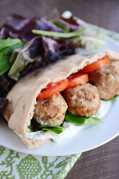 Greek Meatball Stuffed Pitas with Easy Tzatziki Sauce | Mel's Kitchen Cafe | Bloglovin’ Greek Pitas, Easy Tzatziki Sauce, Easy Tzatziki, Pita Pocket Recipes, Stuffed Pita, Meatball Sandwiches, Pita Sandwich, Pita Recipes, Homemade Tzatziki Sauce