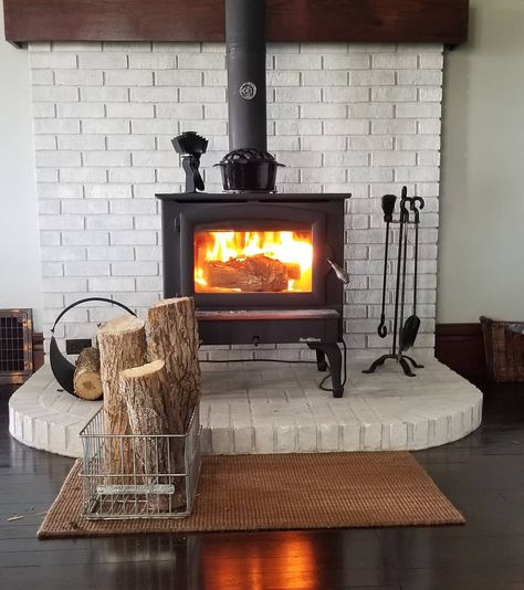 Brick Wood Stove Hearth Ideas -chefkozmo Woodstove Hearths Brick, Wood Stove Fireplace Mantle, Hearth Ideas Wood Stove, Round Hearth Fireplace, Brick Heat Shield For Wood Stove, Wood Burning Stove Mantel Ideas, White Brick Wood Stove, Mantel For Wood Burning Stove, Wood Stove Surrounds Farmhouse