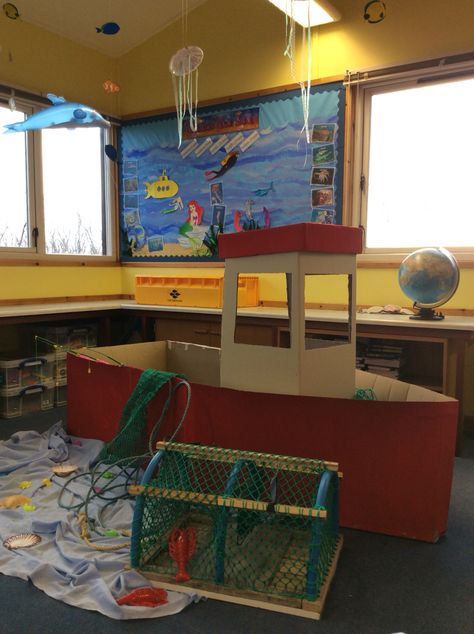 Fishing boat role play area Boat Dramatic Play Preschool, Boat Dramatic Play, Fishing Dramatic Play For Preschool, Fishing Dramatic Play, Under The Sea Role Play, Ocean Dramatic Play, Role Play Areas Eyfs, Kindergarten Tables, Early Years Teaching