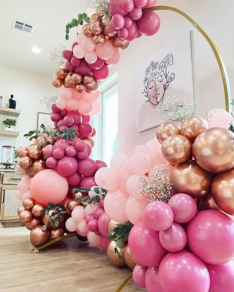 Create a memorable backdrop to enhance the event ambiance. Decorate the gold metal round arch with clusters of rose gold, blush, and pink balloons, and clip some eucalyptus leaf branches and white baby breath flower stems in between for added depth and texture. It’s an eye-catching decor combination that’ll surely captivate the attention of your event guests when special moments are shared. Bridal Decorations Ideas, Purple Wedding Decorations, Bridal Decor, Round Arch, Eucalyptus Leaf, Round Balloons, Bridal Decorations, Baby Breath, Flower Stems