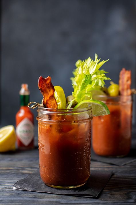 How to make and garnish the perfect Bloody Mary cocktail. The classic Bloody Mary has to have the right balance between smooth and spicy. It has to be refreshing but peppery enough to provide a kick and it can't be too watery either. Building a bloody mary bar for a brunch party. #brunchcocktail #bloodymary Bacon Brunch, Cosmopolitan Cocktail Recipes, Vodka And Pineapple Juice, Summer Vodka Cocktails, Vodka Lime, Classic Cocktail Recipes, Southern Kitchen, Brunch Cocktails, Martini Recipes