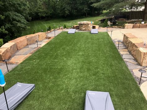 Who doesn't love a game of backyard cornhole? No matter what activities you enjoy in the backyard, we take the time to listen to your needs so we can make the right recommendations for each project. Contact us online for a free quote. . . . . #synlawn #mysynlawn #synlawnusa #artificialgrass #artificialturf #artificiallawn #syntheticturf #syntheticgrass #syntheticlawn #landscapedesign #landscapearchitecture #landscapearchitect #homeimprovement #petturf #petfriendly #kidfriendy #cornhole Turf Backyard Cornhole, Backyard Yard Game Area, Backyard Corn Hole Court, Cornhole Outdoor Area, Outdoor Corn Hole Area, Outdoor Gaming Area, Backyard Corn Hole Area, Corn Hole Area In Backyard, Yard Game Area