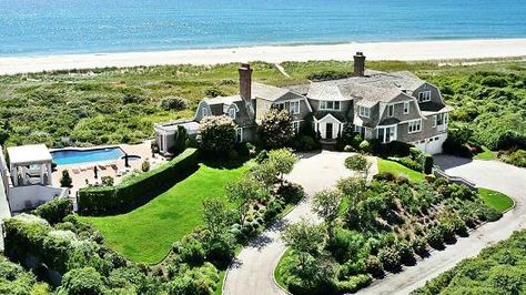 A beachfront home in South Hampton. Hamptons Mansion, Hampton Homes, Hampton Estates, Montauk Ny, Hamptons Summer, Luxury Real Estate Marketing, Brick Chimney, South Hampton, Professional Landscaping