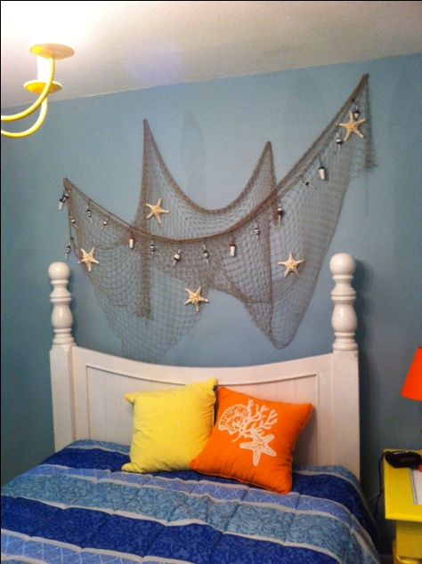 My first attempt at fishnet decor. Fishnet Room Decor, Fishnet Decorating Ideas, Fishnet Wall Decor Ideas, Fish Net Decor, Mermaid Bedroom, Nautical Bedroom, Beach Room, Beach Theme Decor, Beachy Decor