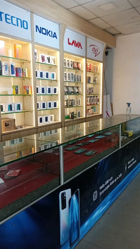 Mobile Shop Display Design, Modern Retail Store Design Exterior, Mobile Showroom Interior Design, Electronic Showroom Interior Design, Mobile Shop Design Interior 3d, Mobile Shop Counter Design, Mobile Shop Counter, Mobile Shop Design Interior, Mobile Store Design