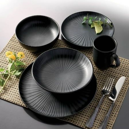 The Oxford Contempo dinnerware collection makes your meal the star of the show with its clean and simplified design making for an excellent foundation for creative plating. The collection's color scheme, rooted in cool tones found in nature, brings a sense of peace and well-being to even the busiest of homes. Oxford Contempo, Onyx Stoneware 20 Piece Dinnerware Set, Service for 4 SET INCLUDES 4 Dinner Plates - Size: 10.25 in (26 cm) 4 Dinner Bowls - Size: 8 in (20.3 cm) Capacity: 24 oz (710 ml) 4 Creative Plating, Black Dinnerware Set, Hogwarts Great Hall, Black Dinnerware, Kitchen Improvements, Dinner Bowls, Stoneware Dinnerware, Cool Tones, Cereal Bowls