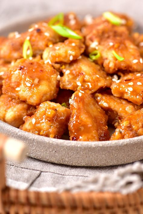 Deliciously sweet and savory, this easy gluten-free orange chicken is a way better alternative to Chinese food takeaway. Learn how simple it is to make this chicken dinner at home, and enjoy it over a steaming bowl of rice, or enjoy it on its own! Totally dairy-free too. Gluten Free Orange Chicken, Chicken Gluten Free, Orange Chicken Sauce, Gluten Free Chinese, Asian Appetizers, Bowl Of Rice, Sweet Chicken, Bean Flour, Orange Chicken Recipe