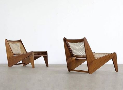 A pair of 'Kangaroo' chairs designed by Pierre Jeanneret. Made from rosewood and cane they were designed for Corbusier's Chandigarh project in 1955. Photo: @zorrobot.de #mcmdaily #pierrejeanneret #corbusier #chandigarh #india #switzerland mcmdaily.com Ottawa Apartment, Kangaroo Chair, Pierre Jeanneret Furniture, Corbusier Chair, Sliver Ring, Decoupage Tray, Cane Furniture, Garnet Crystal, Pierre Jeanneret