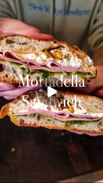 Rocco Gizzo on Instagram: "Mortadella Sandwich | This mortadella sandwich is an absolute classic, and has the best combo of flavors. But what makes this sandwich even better, is that the bread is made with fresh pizza dough.  -Pizza dough -Fresh Pesto -Mortadella  -Stracciatella  -Crushed Pistacchio  -Freshly Cracked Black Pepper -EVOO (I used @getgraza)   Preheat your oven to 500°. Then get yourself some nice pizza dough and stretch it out. Drizzle with some EVOO and fold it over, then drizzle more EVOO on the top.   Bake at 500° for 10-12 minutes until the dough is done and crispy.   Gently separate the dough, and start assembling the sandwich with the pesto, mortadella, stracciatella, crushed pistachio, EVOO, and freshly cracked pepper.   #tastemademedoit #pizzasandwich #mortadellasandw Mortadella Recipe, Fresh Pizza Dough, Mortadella Sandwich, Italian Panini, Fresh Pizza, Dough Pizza, Pizza Sandwich, Pesto Pizza, Easy Italian