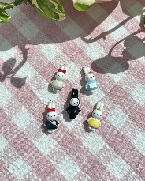 miffy x studio ghibli charms! 🌱🎐🧹🫖 had so much fun creating these! no face has to be my favorite!! 🙂‍↕️ but both versions of kiki are close runner ups! 🎀 #polymerclay #polymerclayart #polymerclayartist #studioghibli #spiritedaway #kikisdeliveryservice #howlsmovingcastle #miffy #nijntje #handmade #claycharms #phonecharms #trinkets Studio Ghibli Trinkets, Studio Ghibli Clay Ideas, Studio Ghibli Gifts, Polymer Clay Trinkets, Diy Clay Charms, Handmade Trinkets, Aesthetic Clay, Clay Things, Phone Charms