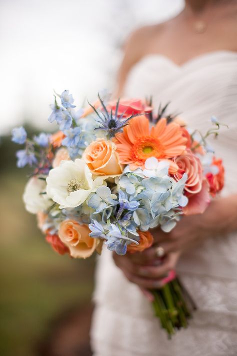 Light Blue And Peach Wedding Flowers, Pink Orange And Blue Bouquet, Peach Pink Blue Wedding, Pink Orange Blue Wedding Theme, Pink Orange Yellow Blue Wedding, Coral And Blue Wedding Colors, Baby Blue And Orange Wedding, July Wedding Flowers In Season, Peach And Blue Wedding Flowers